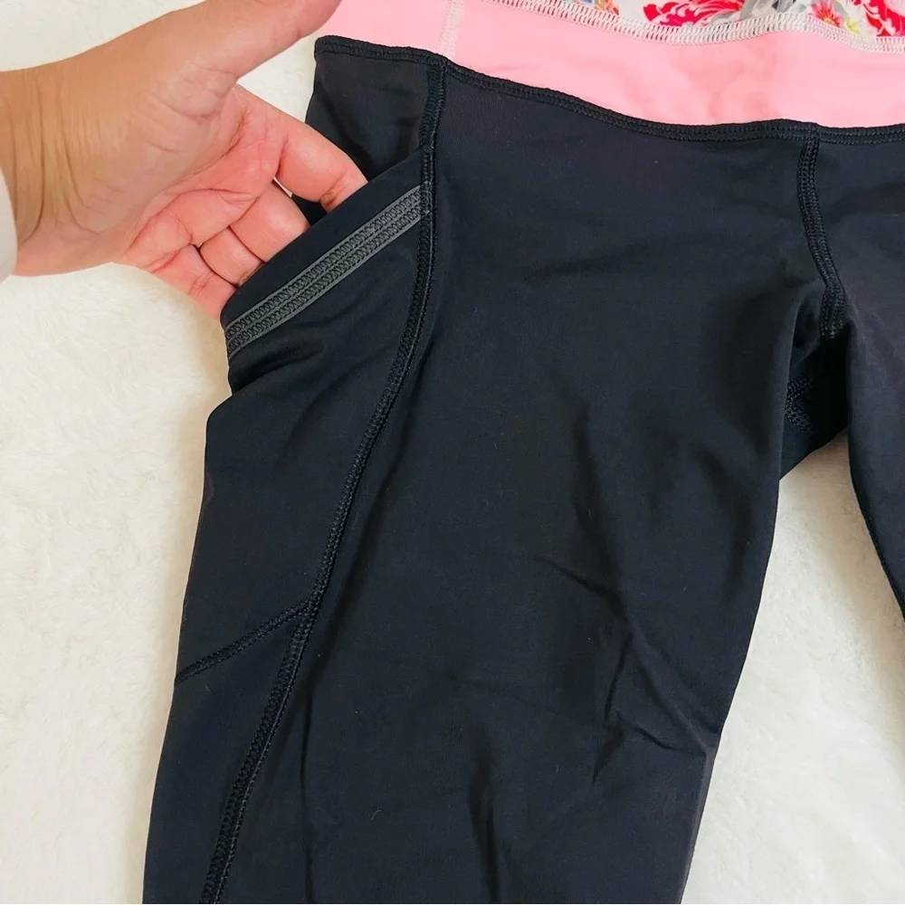 lululemon Cropped Black and Pink Floral Waistband Leggings